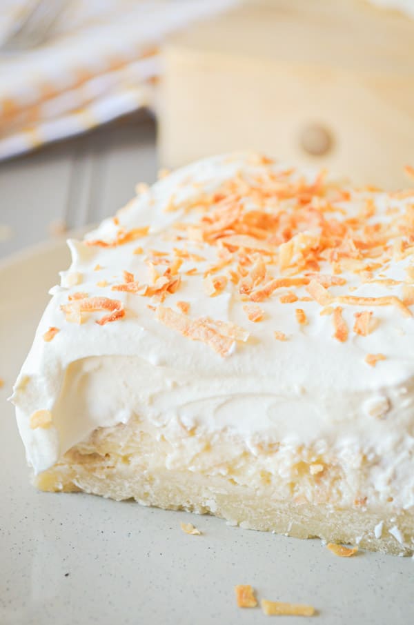 The delicious, creamy taste of Coconut Creme Pie, with the sweet, dense, buttery texture of shortbread. Coconut Cream Shortbread Bars are a MUST TRY recipe!
