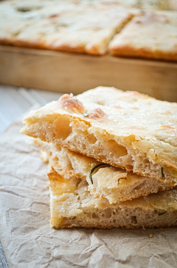 Fun, bubbly, and crisp, Pizza Bianca can serve as a side dish, bread option, or even main course. It all depends on how you choose to top it! This recipe is made with sourdough and is fully fermented overnight for a complex flavor and better digestibility, 